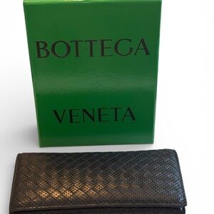 Bottega Veneta  Interratio bifold continental Black Lamskin woven Leather Clutch